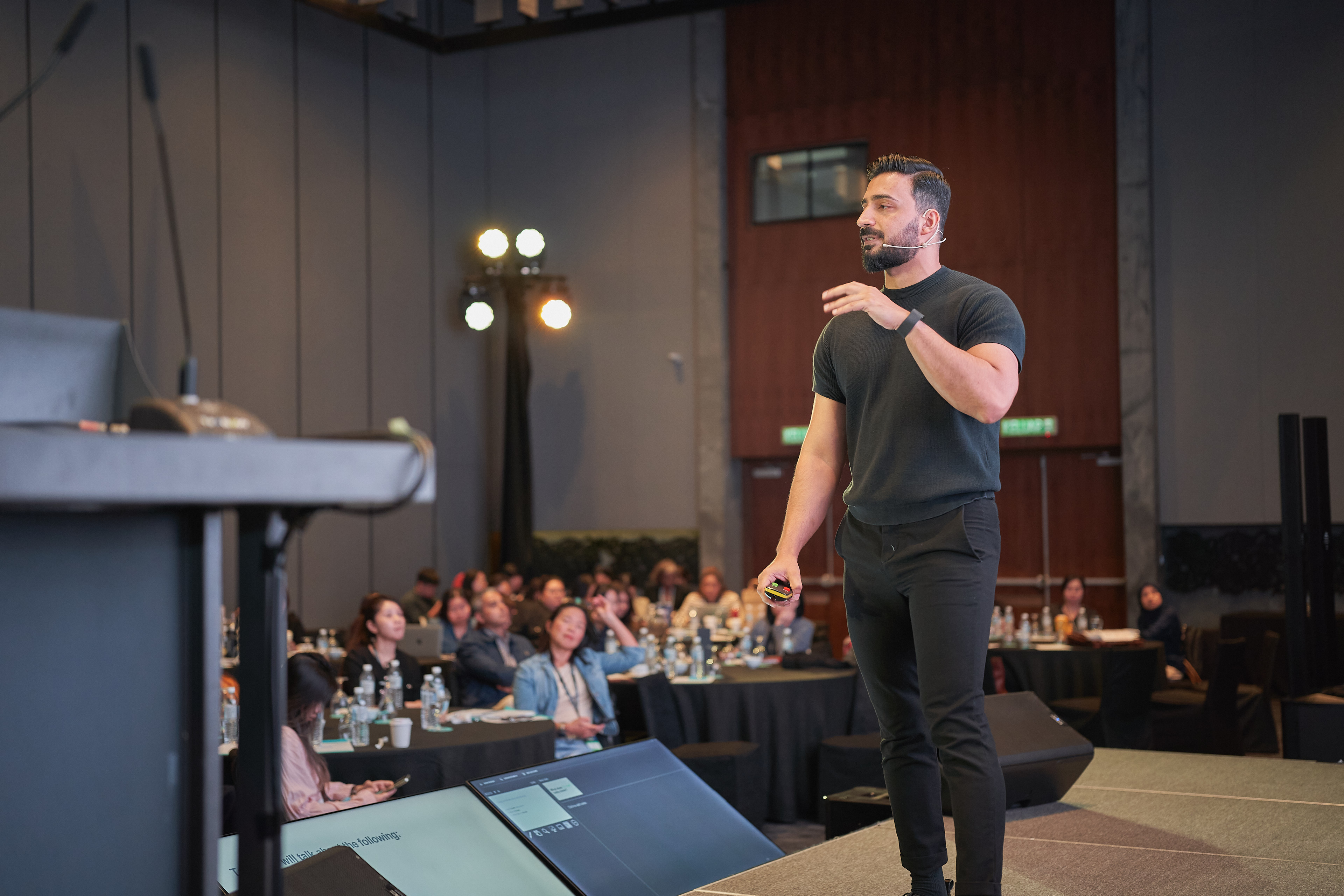 Rafay Korai speaking on stage